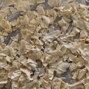 Zero waste sourdough discard - dry your discard in a dehydrator to create a tasty addition to salads, vegetables or bread.