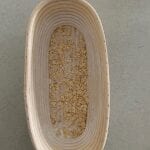 Honey Oat Sourdough Bread - a little trick to getting the oats to stick.