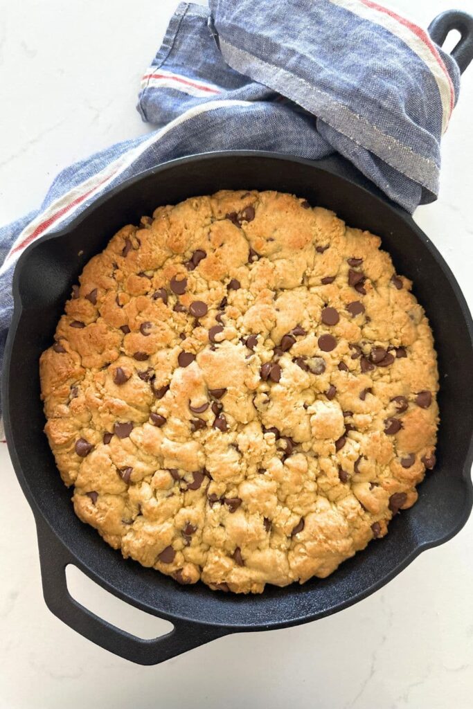 A sourdough cookie skillet that has just come out of the oven.