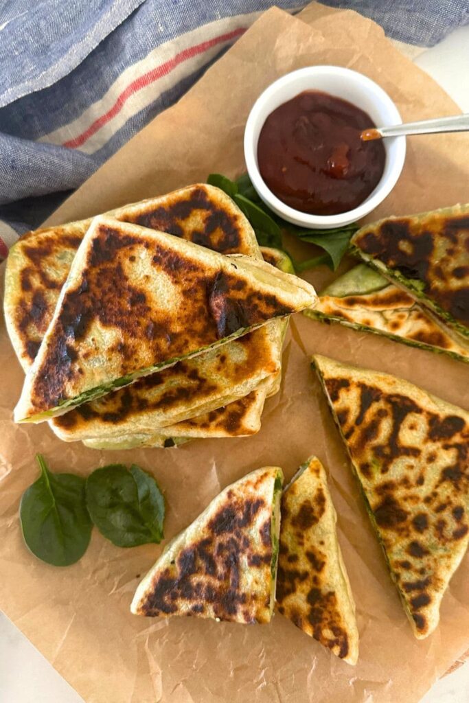 Sourdough gozleme filled with spinach and feta and served with a fruit chutney.
