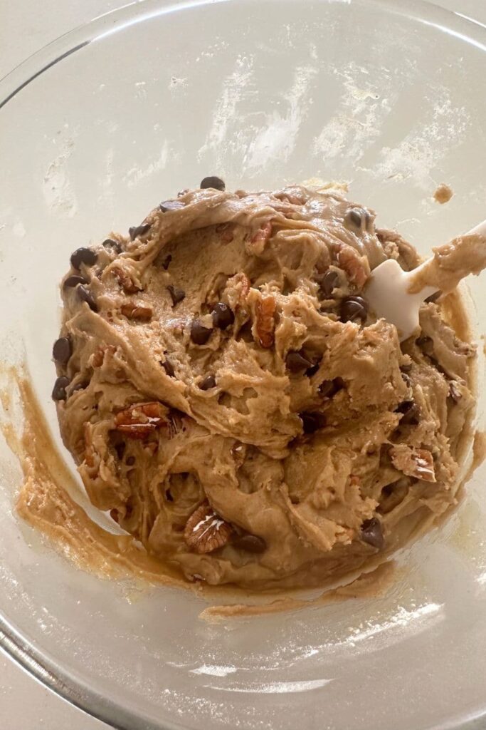 Spiced pecan sourdough cookie dough in a bowl.