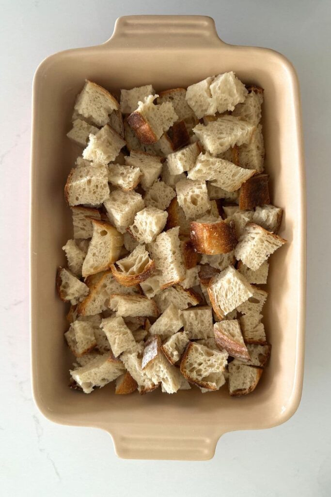 Sourdough bread that has been cubed up ready to make sourdough breakfast casserole.