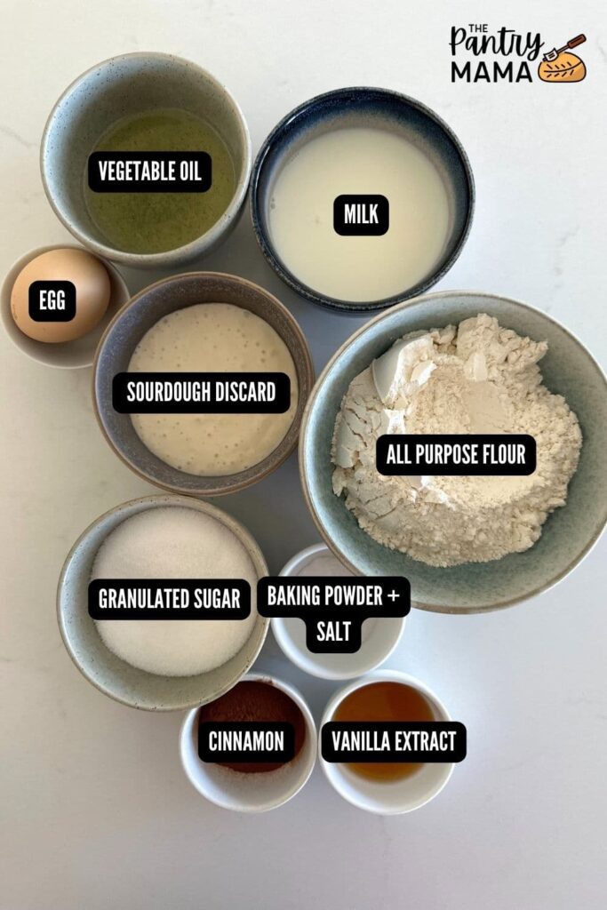 Flat lay of ingredients necessary to make a loaf of sourdough discard cinnamon ripple quick bread.